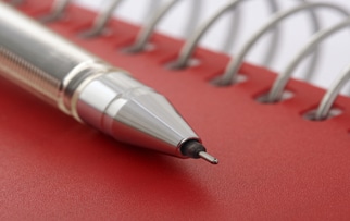 Pen on Red Notebook