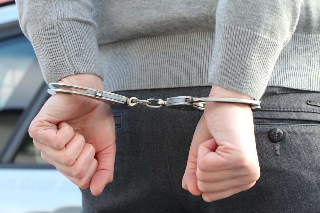 police handcuffs arrest detention